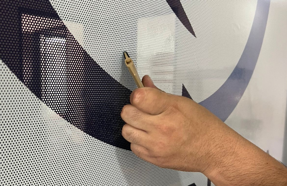 instalación de vinil microperforado para empresa